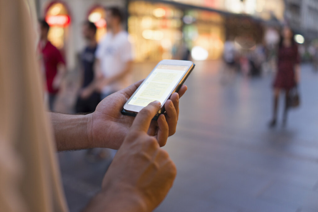 An image of a mobile phone representing SMS marketing. 